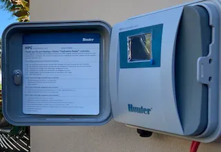 Hunter Hydrawise Wi-Fi controller mounted outdoors