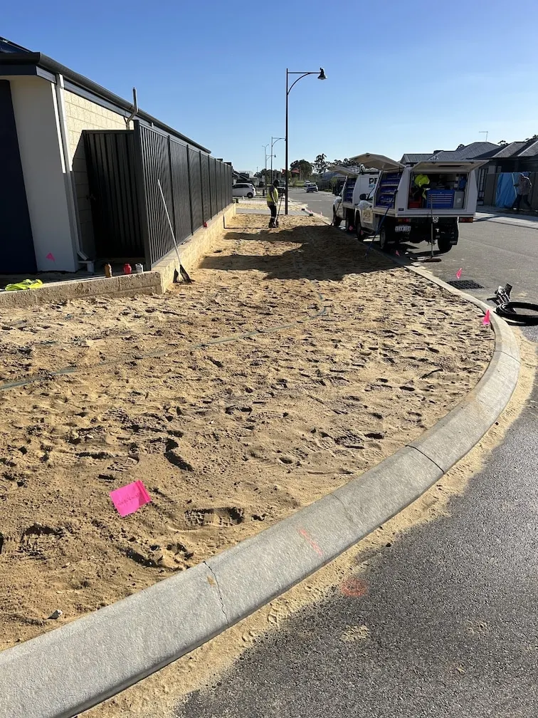 Reticulation technician installing sprinklers