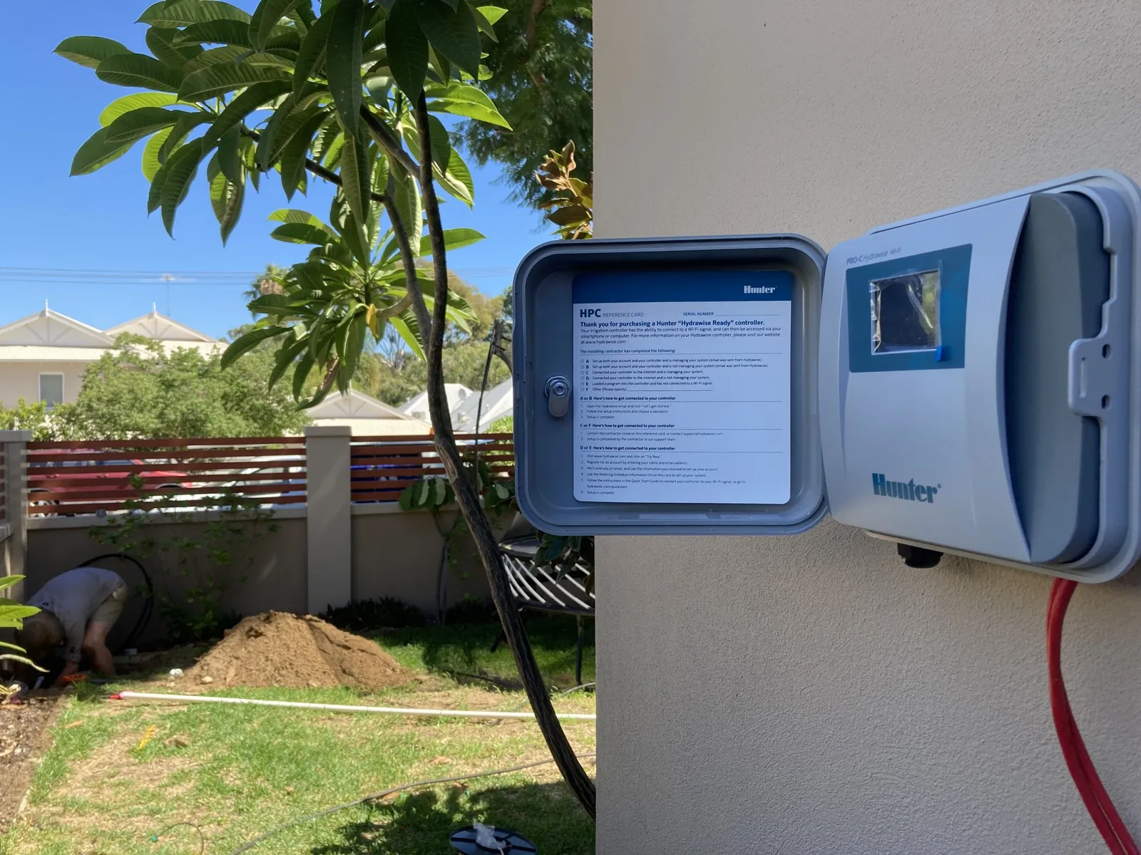 WiFi reticulation controller mounted on a Perth wall